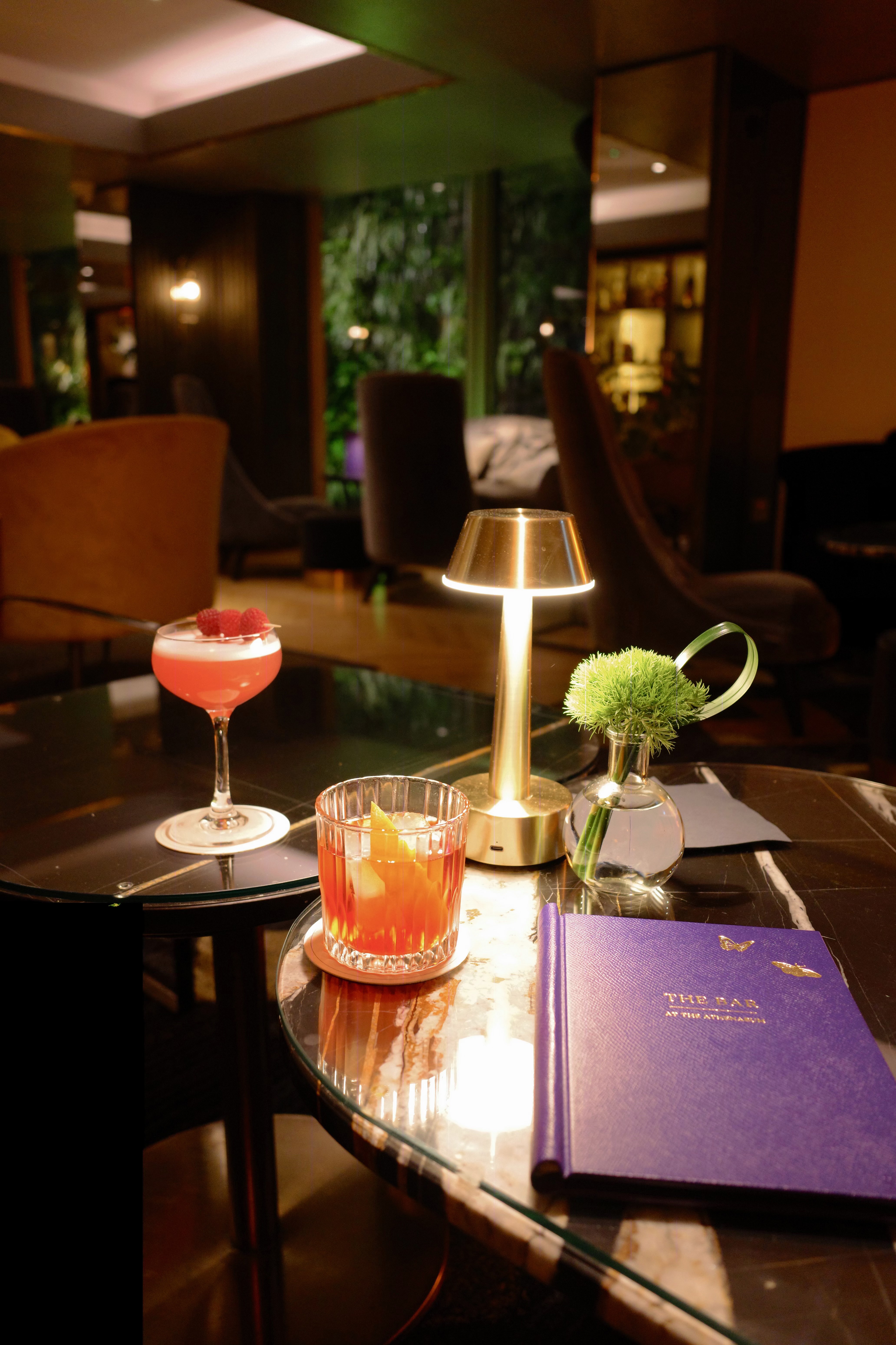 Signature cocktails and menu at The Bar at The Athenaeum
