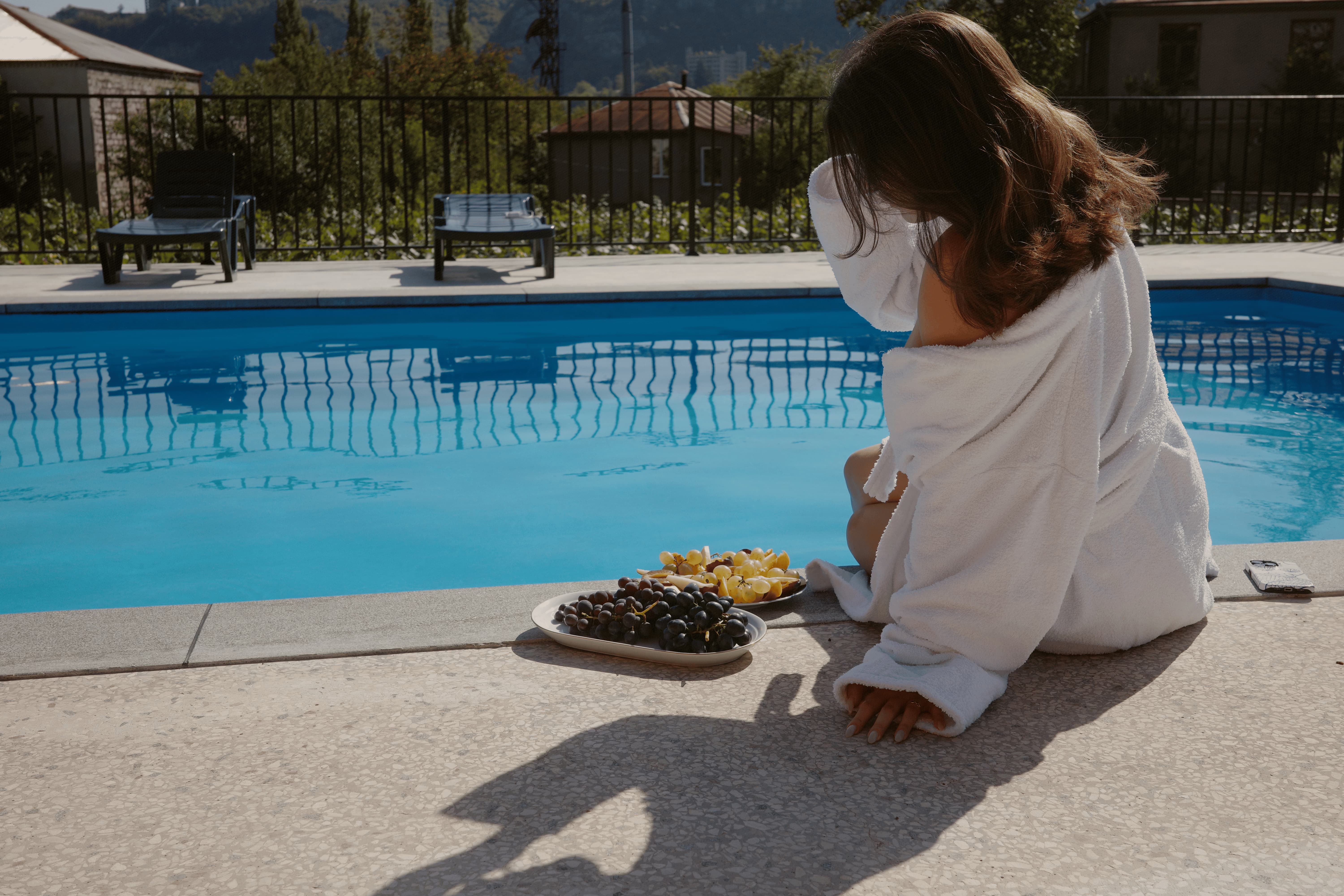 Guest relaxing by the pool