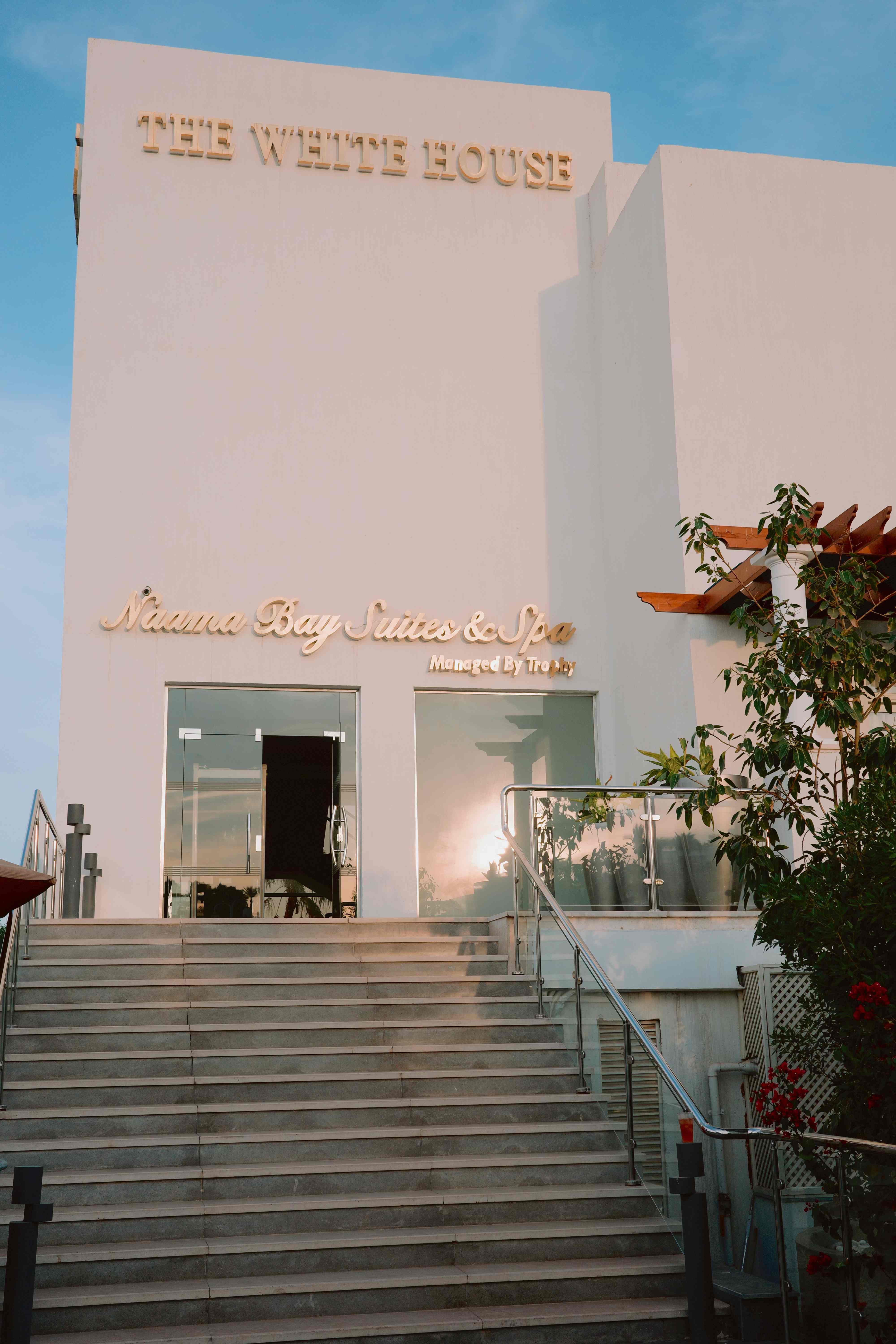 Naama Bay Suites & Spa exterior at golden hour