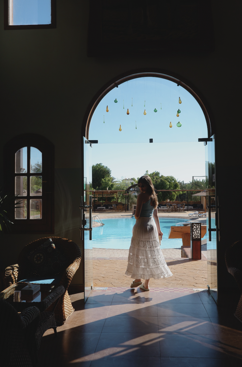 Arched doorway view to pool