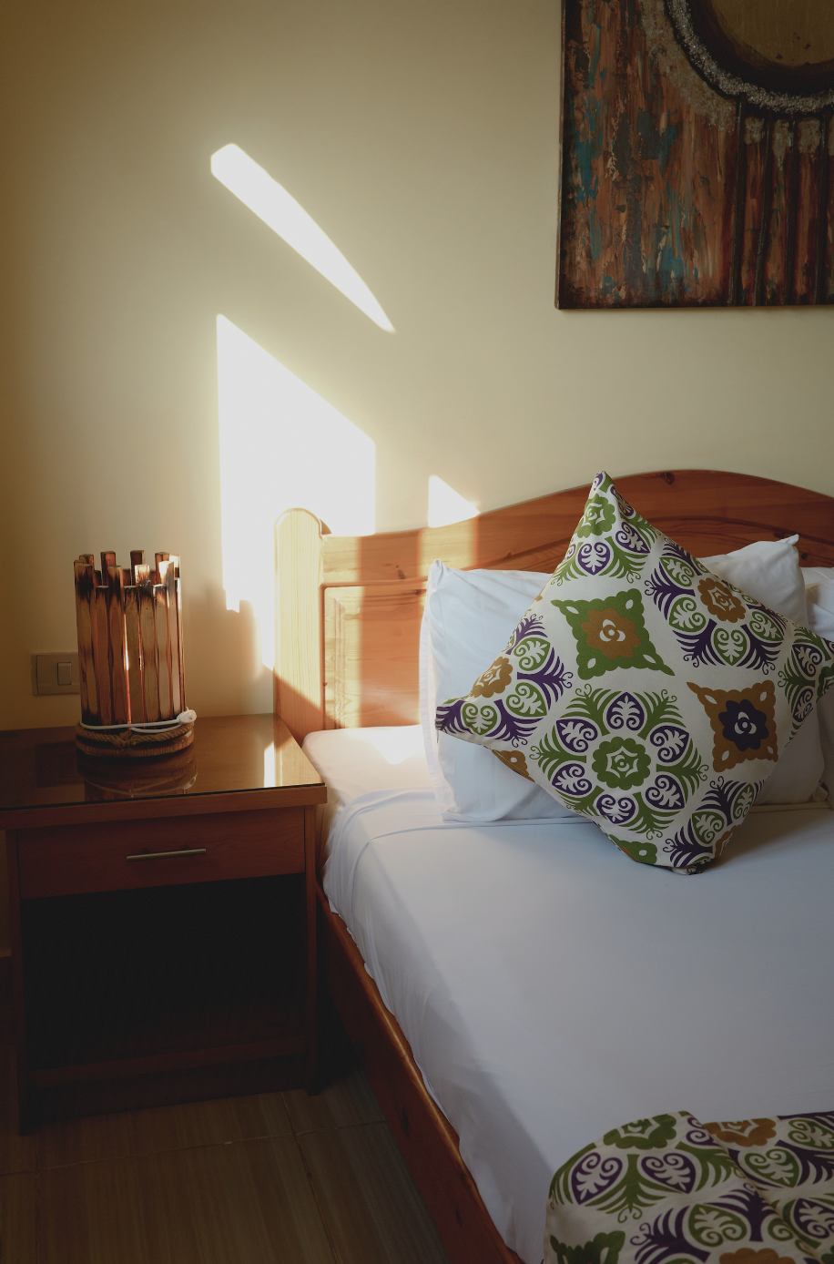 Bedroom with natural sunlight patterns